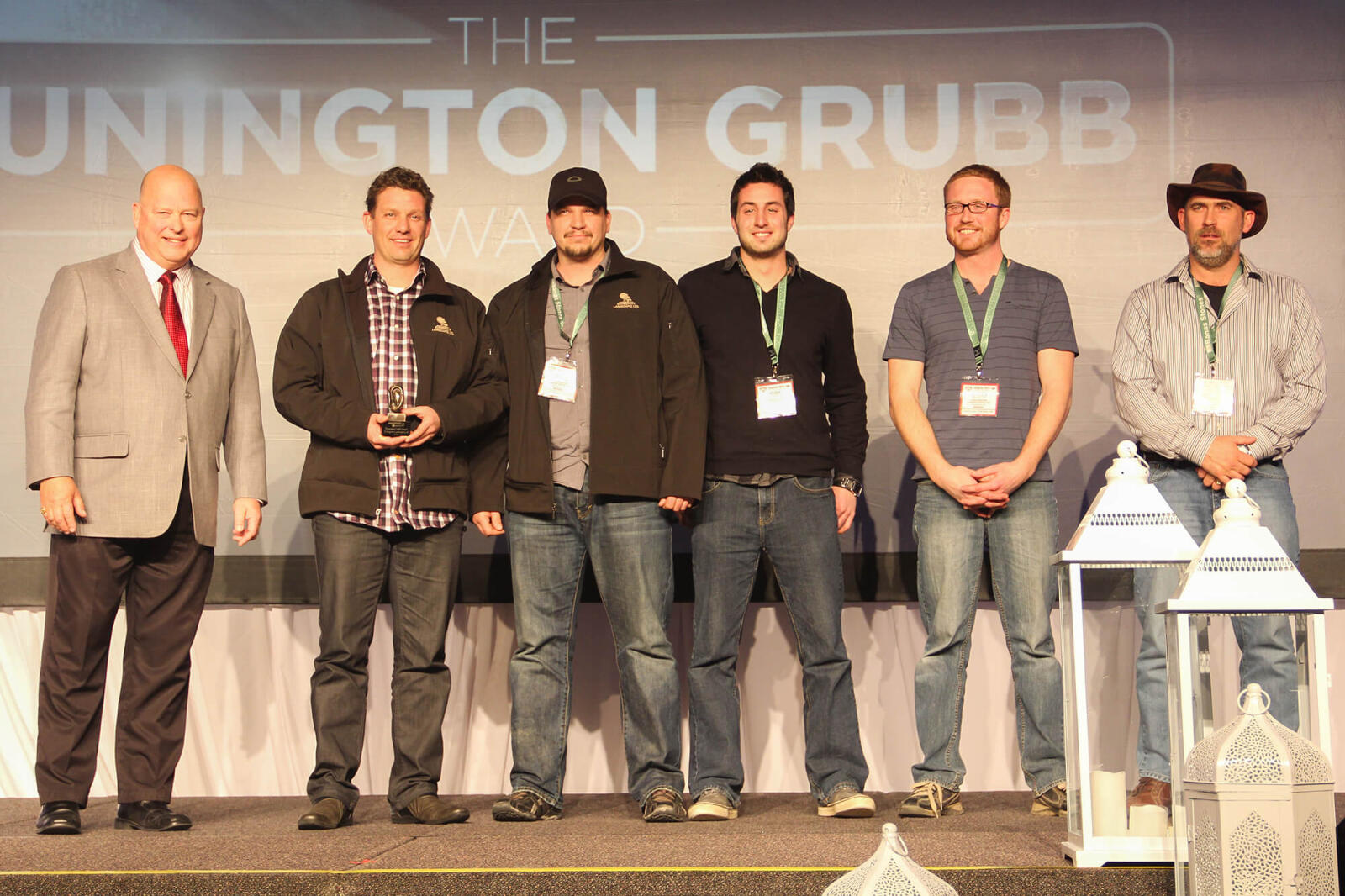 six men on stage