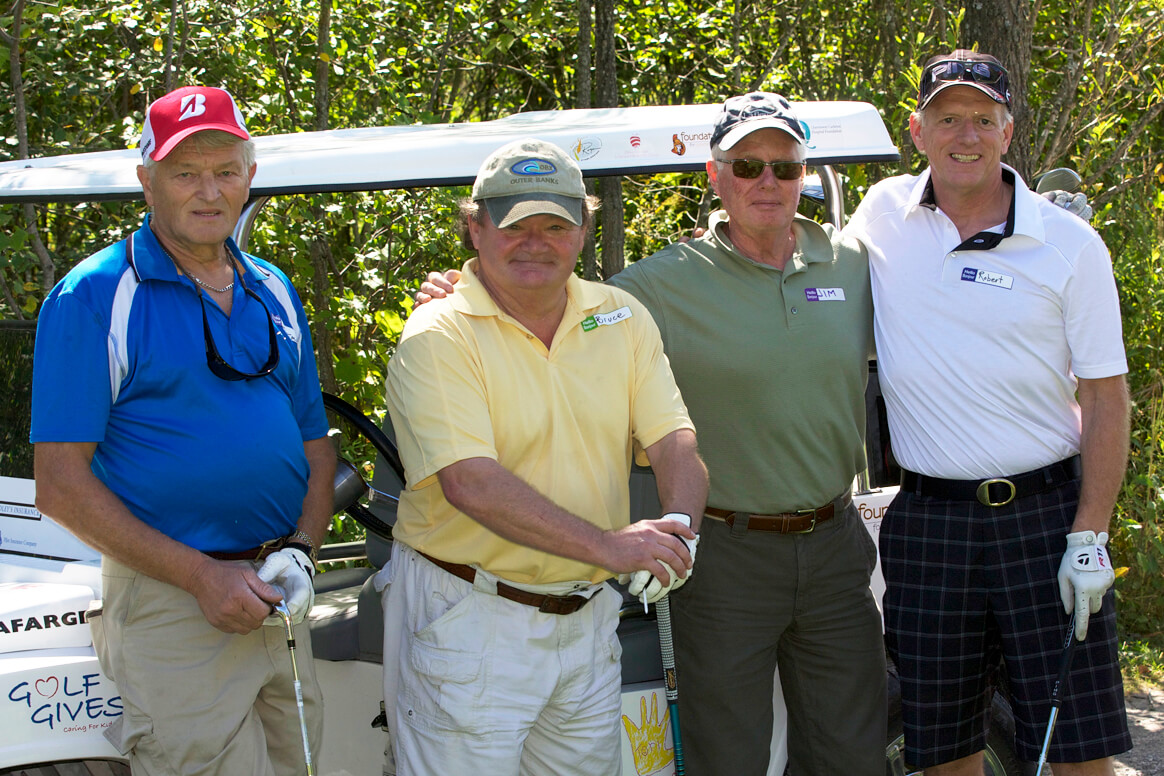 four golfers